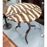 OCCASIONAL TABLE, circular with zebra skin top on triform horned support, 62cm x 64cm H.