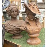 FEMALE BUSTS, a pair, in rusty cast iron.