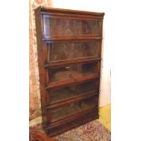 GLOBE WERNICKE BOOKCASE, early 20th century oak of five tier sections with glazed doors,