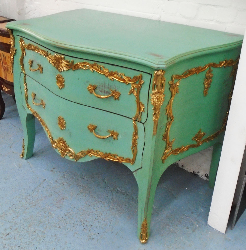 COMMODE, in a distressed effect jade green painted finish, with ormolu mounts, 130cm x 86cm.