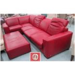 NATUZZI RED LEATHER CORNER SOFA, with sofa bed section and footstool, 185cm x 315cm.