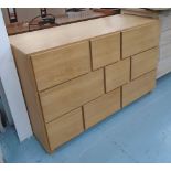 BANK OF DRAWERS, 1960's design oak with nine drawers, 135cm W x 49cm D x 78cm H.