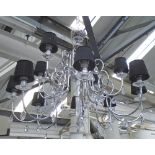 CHANDELIER, twelve branch in chromed metal frame with crystal drops and black shades,