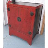 CHINESE CABINET, red lacquer in a distressed finish, 89cm x 64cm x 105cm H.