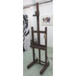 ARTIST EASEL, early 20th beech adjustable height and castors, once property of 'Woodroffe-Hicks',