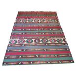 CAUCASIAN KILIM, 311cm x 217cm, of polychrome bands.