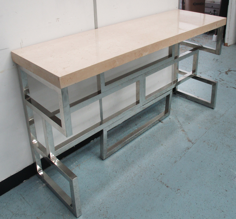 CONSOLE TABLE, with a rectangular travertine top on an abstract chrome base, 108.5cm L x 87.