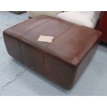 FOOTSTOOL, in tanned leather on bun supports, 92cm x 61cm x 39cm H.