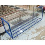 OCCASIONAL TABLE, in glass with shelves below on a blue metal base, 138cm x 46cm x 54cm H.