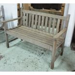 GARDEN BENCH, weathered teak and slatted construction, 125cm W.