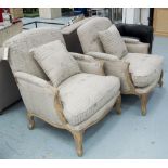 ARMCHAIRS, a pair, in printed fabric with scatter cushion on distressed oak frames, 80cm W.