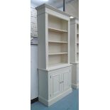 CREAM PAINTED BOOKCASE, with cupboard beneath, 86cm W x 34cm D x 202cm H.