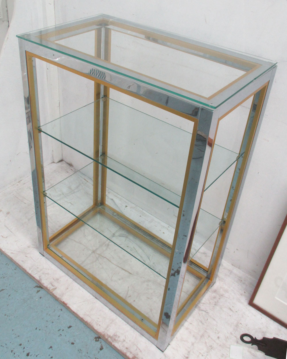 SHELVES, 1970's Italian zevi, chrome, with two glass shelves, 76cm x 103cm H x 36cm D.