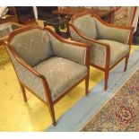 ARMCHAIRS, a pair, early 20th century, Swedish, with elm showframes.