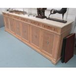 SIDEBOARD, of large proportions in limed oak and marble sectional top,