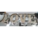 WALL SIGN, 'Love', in metal with illumination, 82cm L.