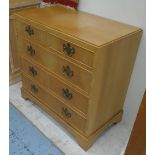 CHEST OF DRAWERS, in oak with two short and three long drawers on bracket supports,