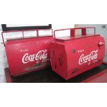 ICE COOLERS, a pair, red painted metal, with 'Coca Cola' label to side, 44cm x 23cm x 37cm H.
