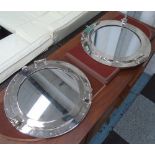 PORTHOLE MIRRORS, a pair, 46cm diam. max.