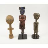 TRIBAL FIGURES, three various, West African carved wooden examples.
