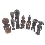 TRIBAL FIGURES, seven various, West African carved wood examples, Bembe, Ashanti and others,