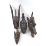 TRIBAL FACE MASK, four various, Bamana and others, West African carved wood, tallest 51cm H.