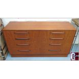 G PLAN CHEST, teak, with four drawers, 142cm W x 45cm D x 76cm H.