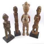 TRIBAL FIGURES, four various, carved wood, variously Tika, Lobi and Yoruba, tallest 57cm H max.
