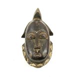 BAULE CEREMONIAL MASK, carved wood, 32cm H x 17cm W overall.