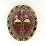 GURO RED FESTIVAL MASK, painted and carved wood, 28cm H.