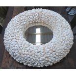 MIRROR, circular, in a decorative frame made from seashells, 91cm diam.