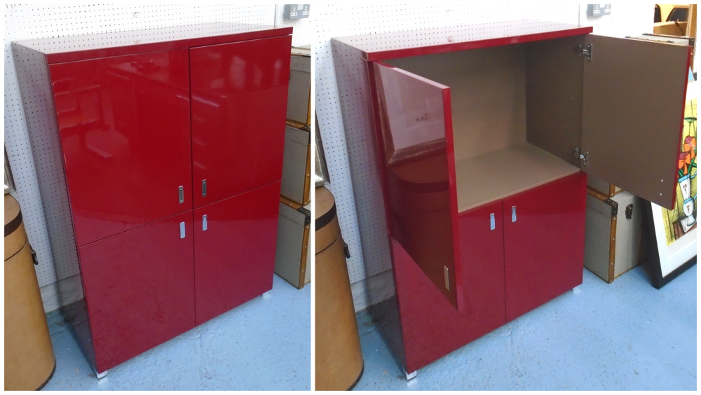 CABINET, red lacquered finish, with four doors, 90cm W x 127cm H x 45cm D.