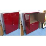 CABINET, red lacquered finish, with four doors, 90cm W x 127cm H x 45cm D.
