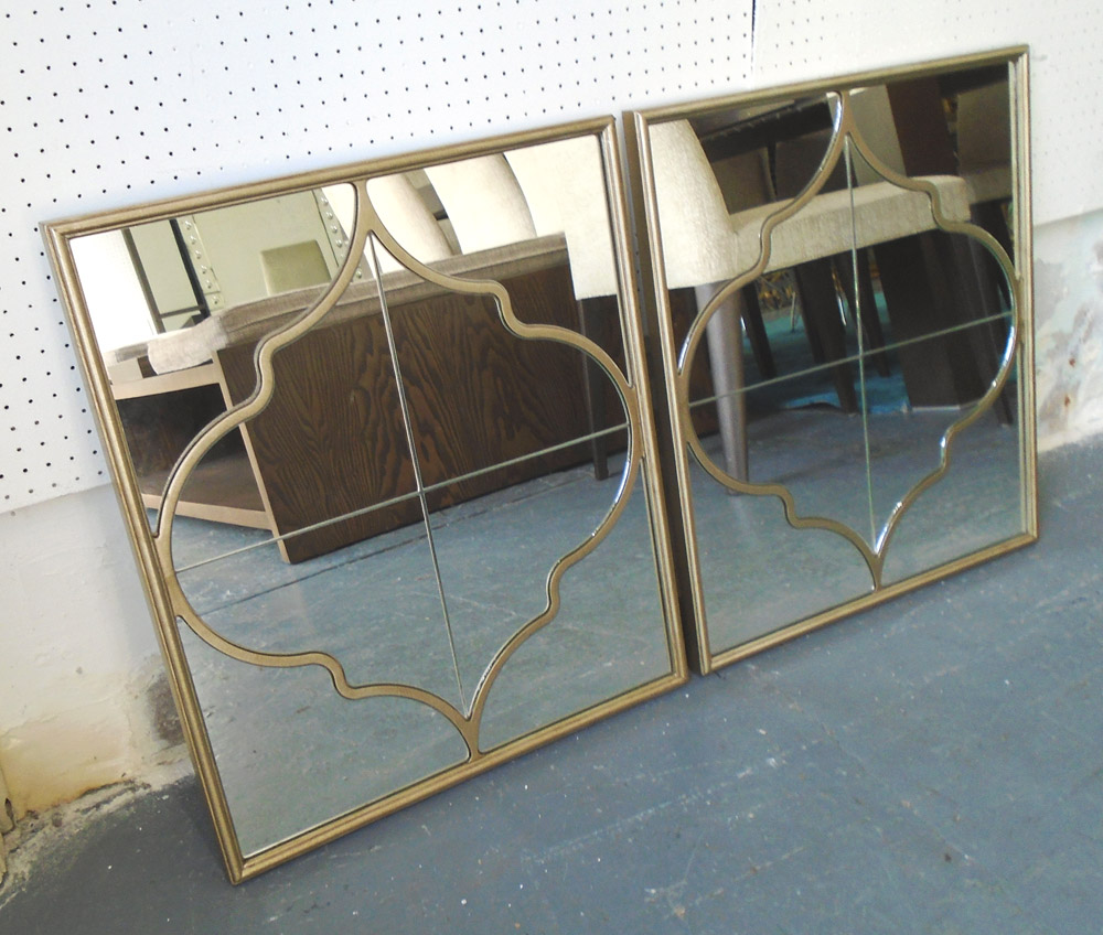 MIRRORS, a pair, bevelled plate with studded, mirrored border, 100cm x 70cm.