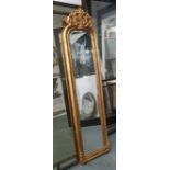 PIER MIRROR, Louis XV style, bevelled plate in an ornate gilded frame, 205cm x 50cm.