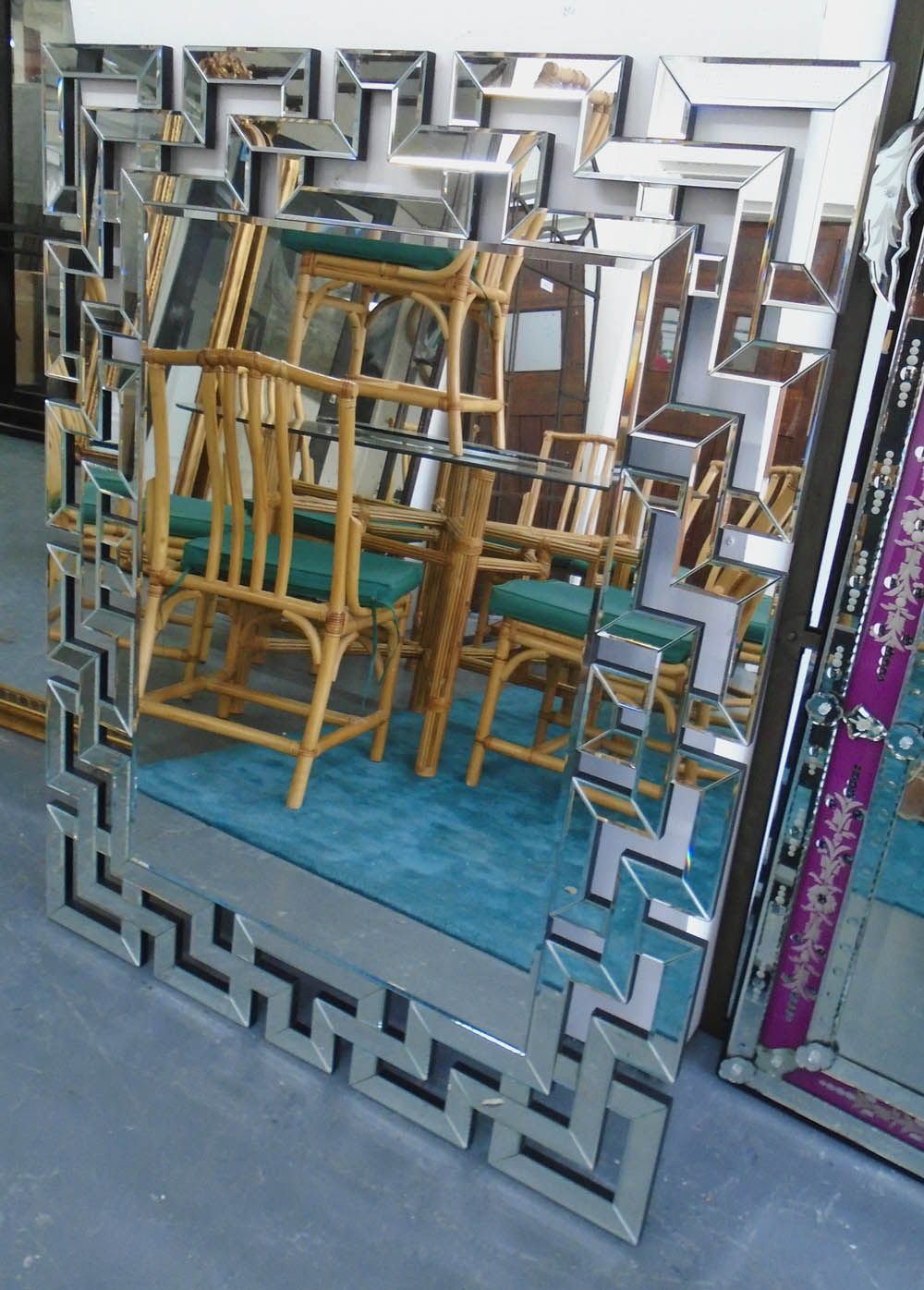 MIRROR, bevelled plate, with geometric Greek key mirrored surround,