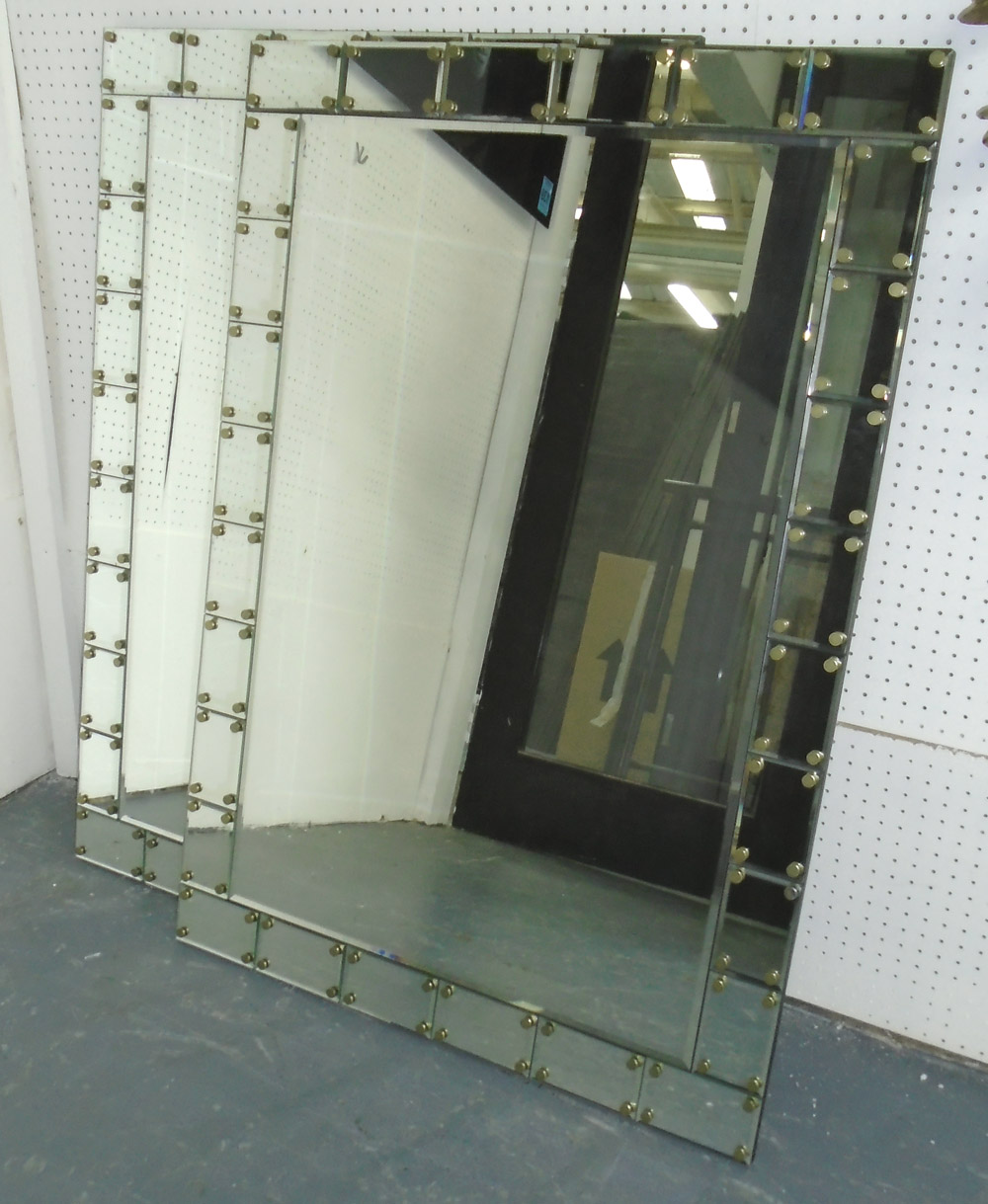 MIRRORS, a pair, bevelled with studded mirrored border, 100cm x 70cm.