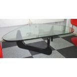 LOW TABLE, in the style of Isamu Noguchi, lacquered wood base with a tempered glass top,