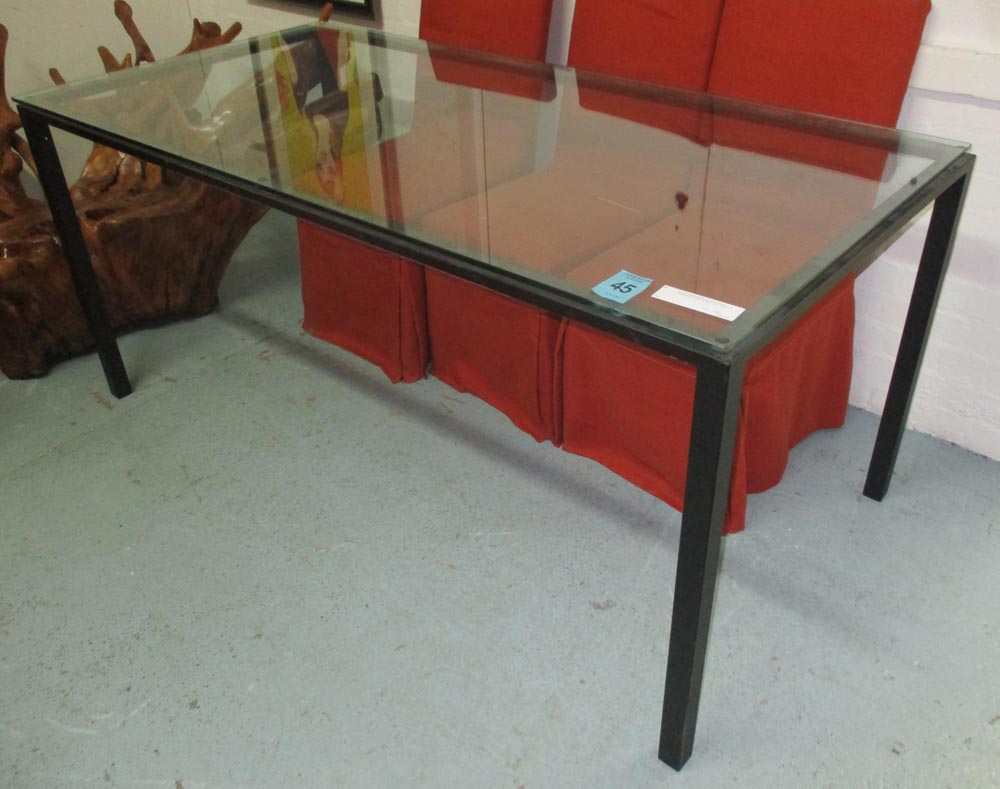 GLASS TABLE/DESK, by Tom Faulkner, with metal frame, 77cm H x 85cm W x 170cm L.