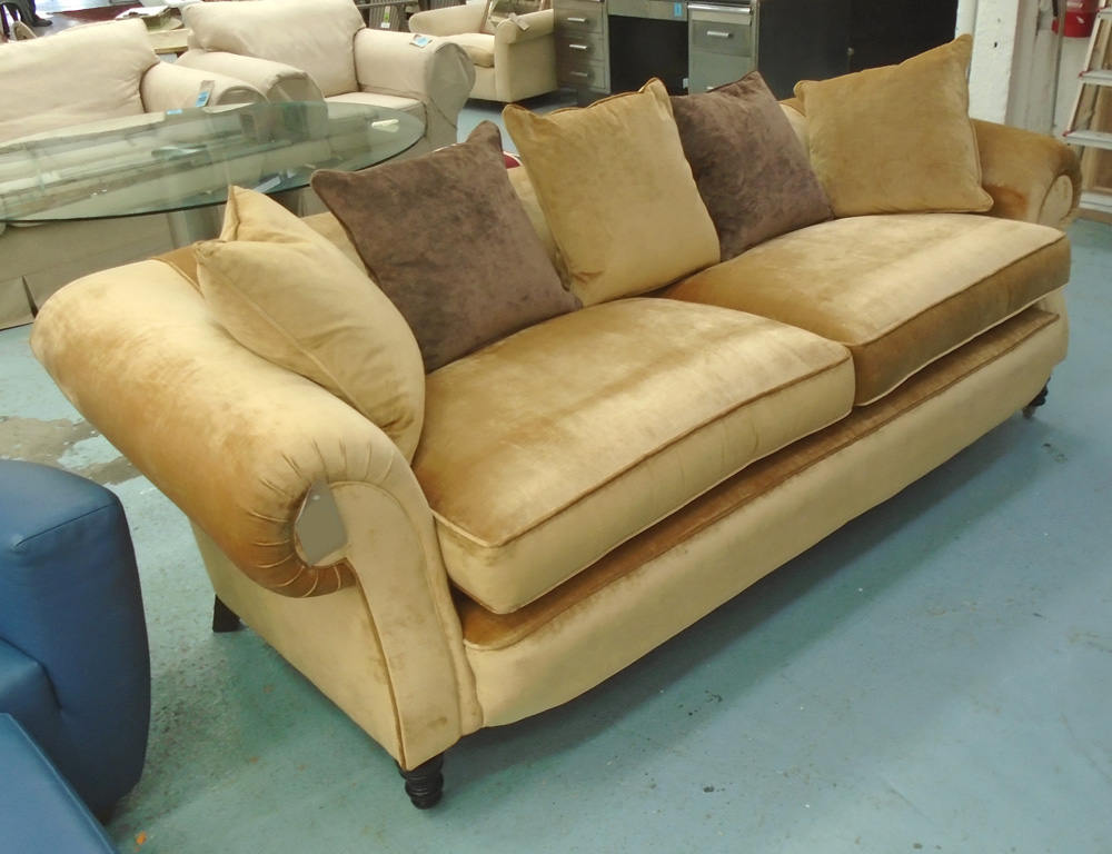 SOFA, by Andrew Martin, in gold velvet upholstery, 103cm D x 245cm W x 81cm H.