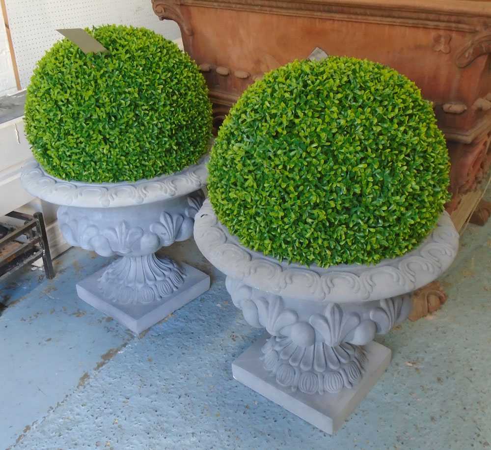 GARDEN URNS, a pair, in grey finish with imitation hedge ball, 80cm H.