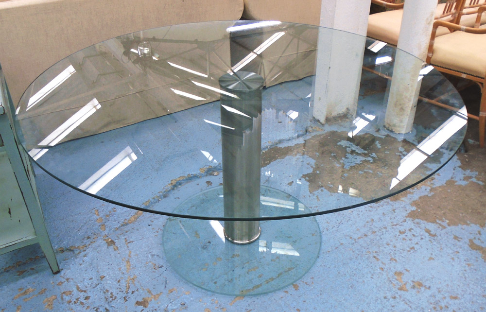 DINING TABLE, with circular glass top and metal column, 150cm W x 75cm H.