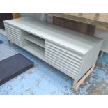 LOW MEDIA TABLE, by Content By Conran, 'Henley' in eau de nil with louvered cabinet doors,