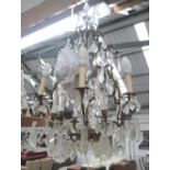 CHANDELIER, having eight metal branches with cut glass droplets, hung 54cm W x 95cm H.