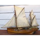 MODEL of a Lowestoft fishing boat, in full sail, 127cm L x 106cm H (with faults).