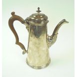 SILVER COFFEE POT, George III, of tapering cylindrical form, 'C' scroll wooden handle, London 1776,