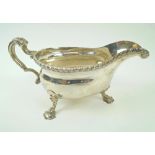 SILVER SAUCE BOAT, Edward VII, with scroll handle and gadrooned detail, London 1903,