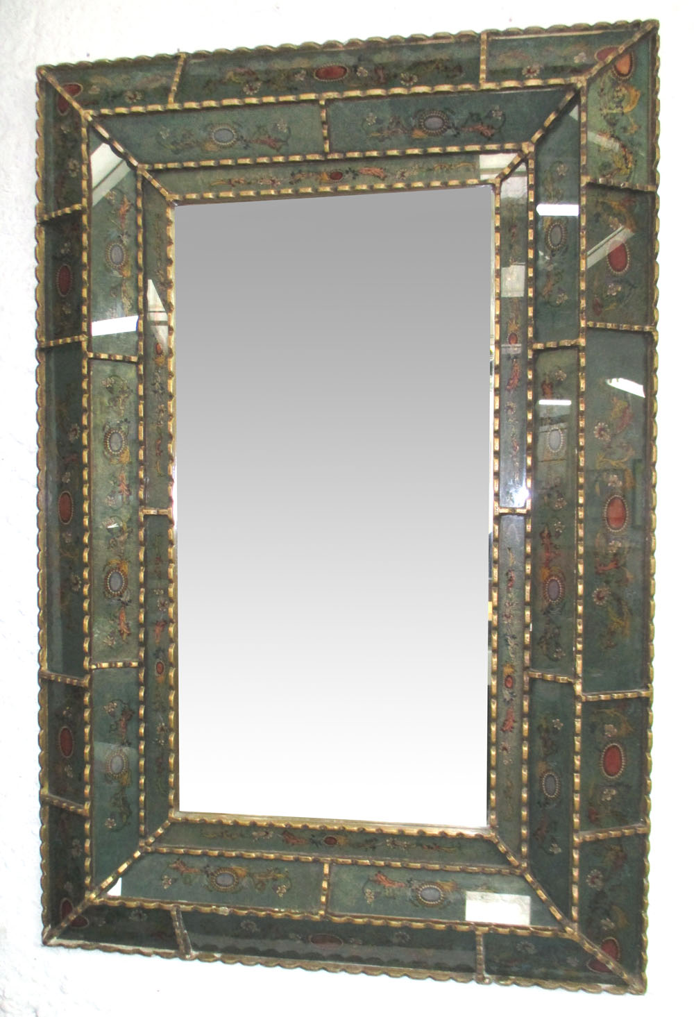 WALL MIRROR, floral decorated eglomise cushion framed with bevelled rectangular plate, 122cm x 82cm.