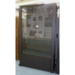 DISPLAY CABINET, dark wood with glass doors and shelves and lights, 102cm W x 45cm D x 177cm H.