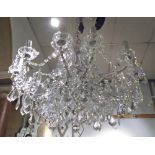 CHANDELIER, Louis XV style, twelve branch silver frame with crystal faceted drops,